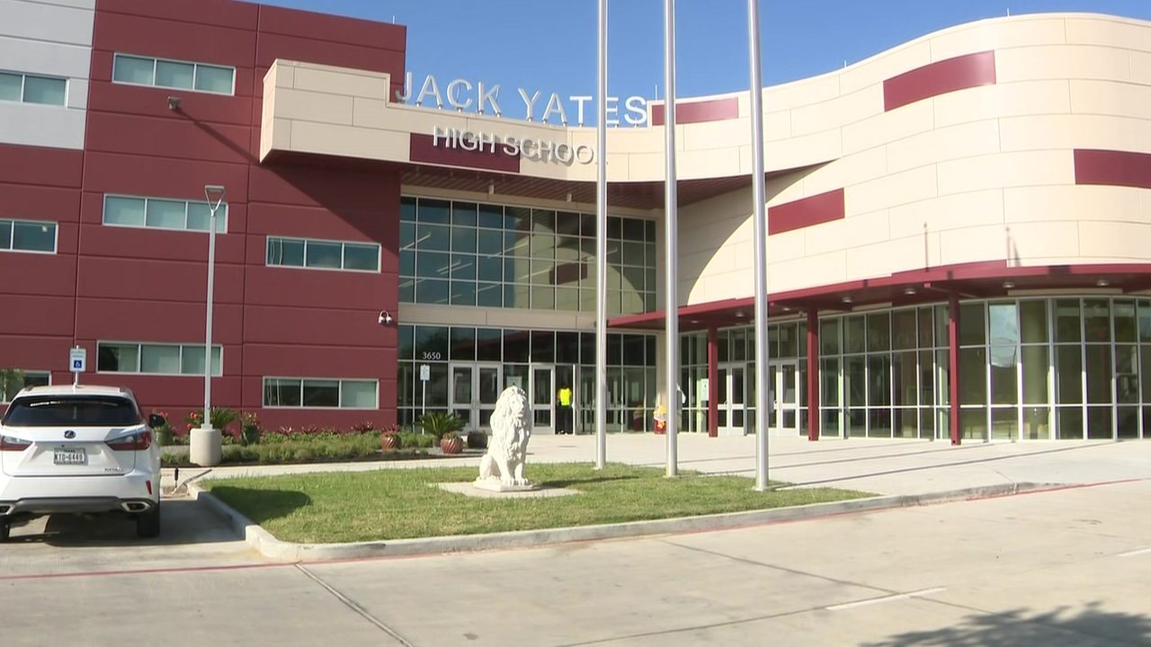 Students at new Jack Yates High School head back to class in...